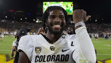 Oct 7, 2023; Tempe, Arizona, USA; Colorado Buffaloes quarterback Shedeur Sanders (2) celebrates after defeating the Arizona State Sun Devils at Mountain America Stadium, Home of the ASU Sun Devils. Mandatory Credit: Mark J. Rebilas-Imagn Images