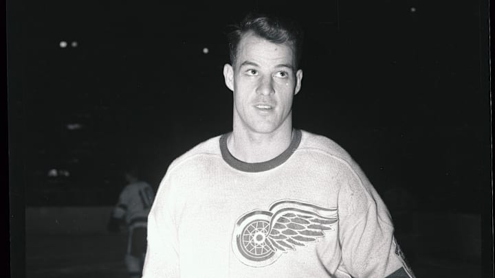 Gordon Howe on Ice With Hockey Stick