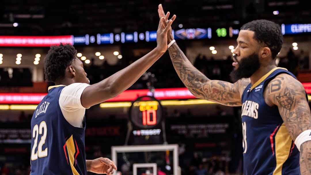 Mar 18, 2026; New Orleans, Louisiana, USA;  New Orleans Pelicans center Derik Queen (22) slaps hands with guard/forward Saddiq Bey (41) against the LA Clippers during first half at Smoothie King Center. Mandatory Credit: Stephen Lew-Imagn Images