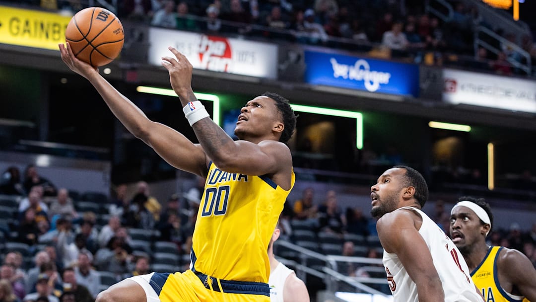 Dec 1, 2025; Indianapolis, Indiana, USA; Indiana Pacers guard Bennedict Mathurin (00) shoots the ball while Cleveland Cavaliers center Evan Mobley (4) defends in the second half at Gainbridge Fieldhouse. Mandatory Credit: Trevor Ruszkowski-Imagn Images Dec 1, 2025; Indianapolis, Indiana, USA; Indiana Pacers guard Bennedict Mathurin (00) shoots the ball while Cleveland Cavaliers center Evan Mobley (4) defends in the second half at Gainbridge Fieldhouse. Mandatory Credit: Trevor Ruszkowski-Imagn Images