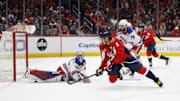 Jan 4, 2025; Washington, District of Columbia, USA; Washington Capitals left wing Alex Ovechkin (8) scores a goal on New York Rangers goaltender Jonathan Quick (32) in the third period at Capital One Arena. Mandatory Credit: Geoff Burke-Imagn Images