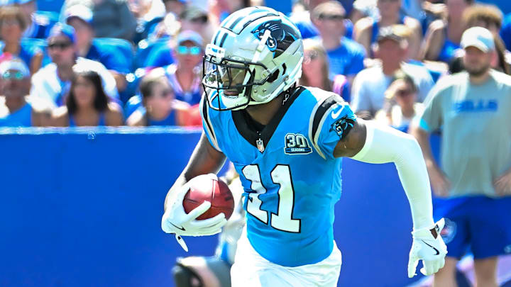 Aug 24, 2024; Orchard Park, New York, USA;  Carolina Panthers wide receiver Ihmir Smith-Marsette (11) returns a kickoff against the Buffalo Bills in the second quarter pre-season game at Highmark Stadium.  