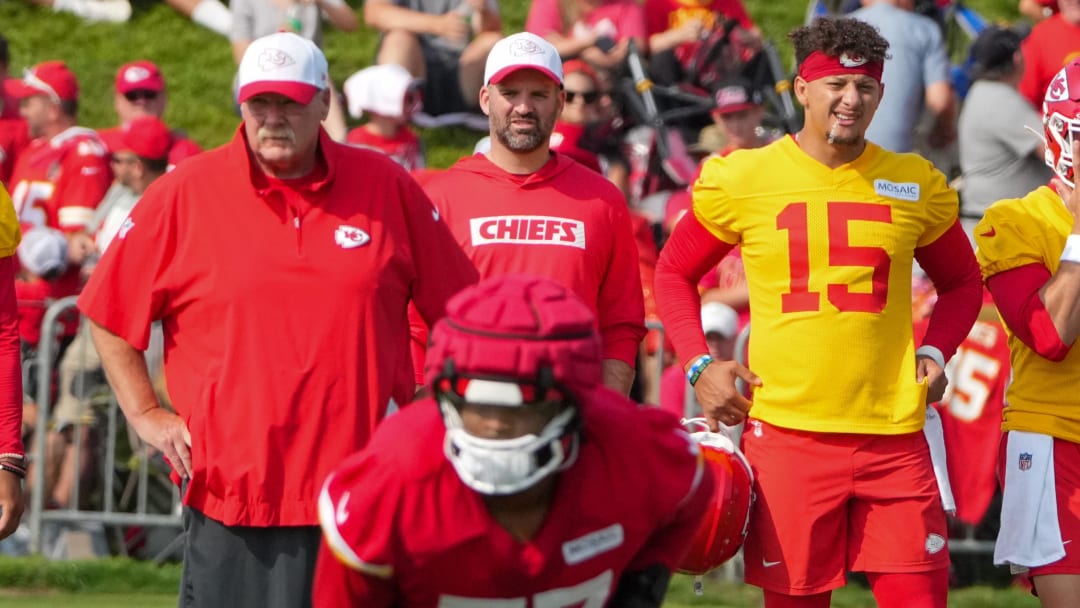 Jul 22, 2024; St. Joseph, MO, USA; Kansas City Chiefs head coach Andy Reid and quarterback Patrick Mahomes (15) look on during training camp at Missouri Western State University. Mandatory Credit: Denny Medley-USA TODAY Sports