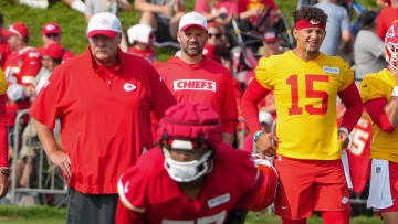 Jul 22, 2024; St. Joseph, MO, USA; Kansas City Chiefs head coach Andy Reid and quarterback Patrick Mahomes (15) look on during training camp at Missouri Western State University. Mandatory Credit: Denny Medley-USA TODAY Sports