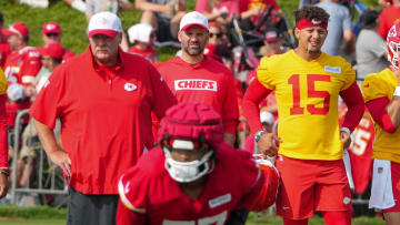 Jul 22, 2024; St. Joseph, MO, USA; Kansas City Chiefs head coach Andy Reid and quarterback Patrick Mahomes (15) look on during training camp at Missouri Western State University. Mandatory Credit: Denny Medley-USA TODAY Sports