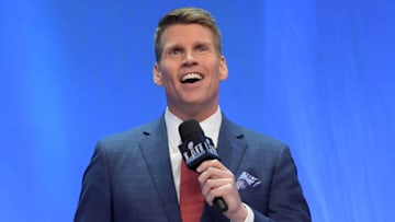 NFL Network broadcaster Scott Hanson speaks with the Lombardi trophy by his side in 2018.