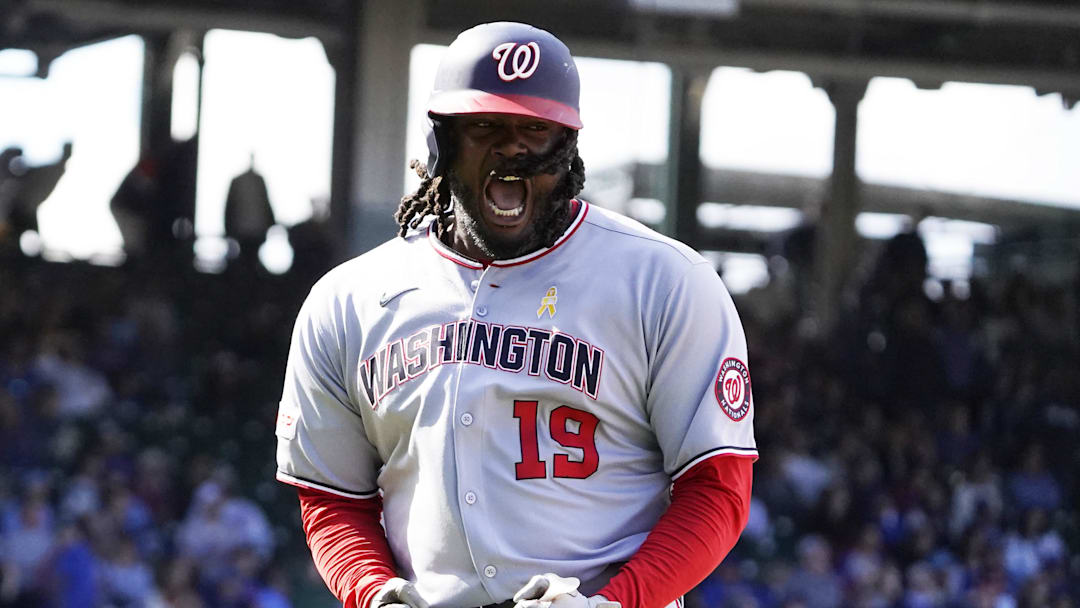 Sep 7, 2025; Chicago, Illinois, USA; Washington Nationals pinch-hitter Josh Bell (19) gestures after hitting a three-run home run against the Chicago Cubs during the ninth inning at Wrigley Field. 