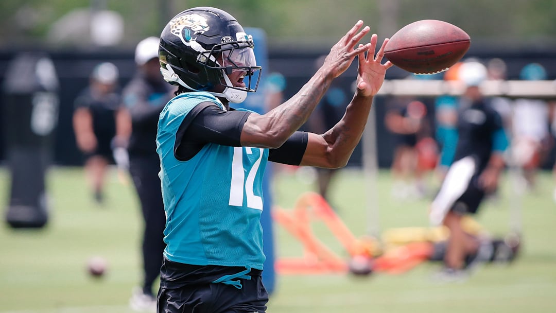 May 10, 2025; Jacksonville, FL, USA; Jacksonville Jaguars wide receiver Travis Hunter (12) catches a pass during rookie minicamp at Miller Electric Center. Mandatory Credit: Travis Register-Imagn Images