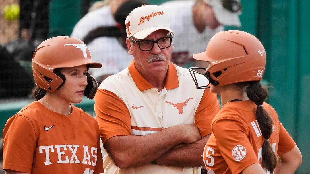 April 2, 2026; Tuscaloosa, AL, USA; Texas head coach Mike White with players Leighann Goode and Jaycie Nichols.