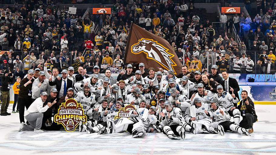 Western Michigan Broncos pose for a photo with the national championship trophy