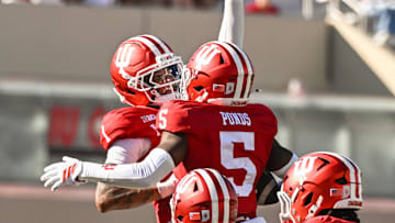 Aug 30, 2025; Bloomington, Indiana, USA; Indiana Hoosiers defensive back Amare Ferrell (1) celebrates with Indiana Hoosiers defensive back D'Angelo Ponds (5) after an interception during the second half against the Old Dominion Monarchs at Memorial Stadium. Mandatory Credit: Robert Goddin-Imagn Images