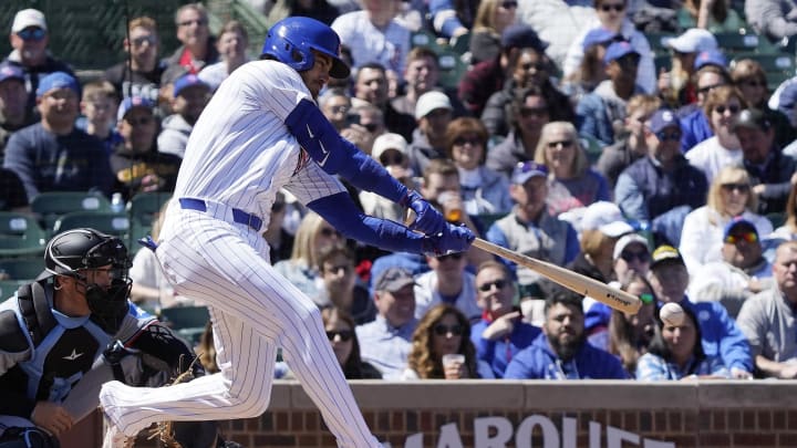 Apr 19, 2024; Chicago, Illinois, USA; Chicago Cubs outfielder Cody Bellinger (24) hits a RBI single Apr 19, 2024; Chicago, Illinois, USA; Chicago Cubs outfielder Cody Bellinger (24) hits a RBI single