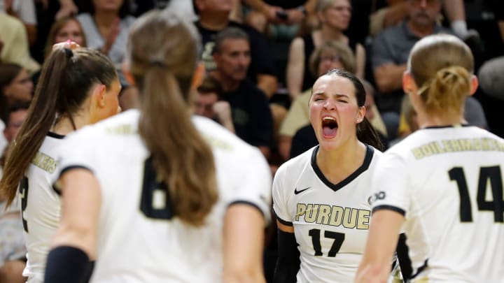 Purdue Boilermakers Eva Hudson (17) celebrates with teammates 