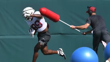 The Crimson Tide players and coaches work during practice Tuesday, Aug. 6, 2024. Alabama wide receiver Kaleb Fleming (39) avoids a ball as he does an agility drill.