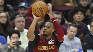 Dec 1, 2024; Cleveland, Ohio, USA; Cleveland Cavaliers guard Darius Garland (10) shoots in the third quarter against the Boston Celtics at Rocket Mortgage FieldHouse. Mandatory Credit: David Richard-Imagn Images