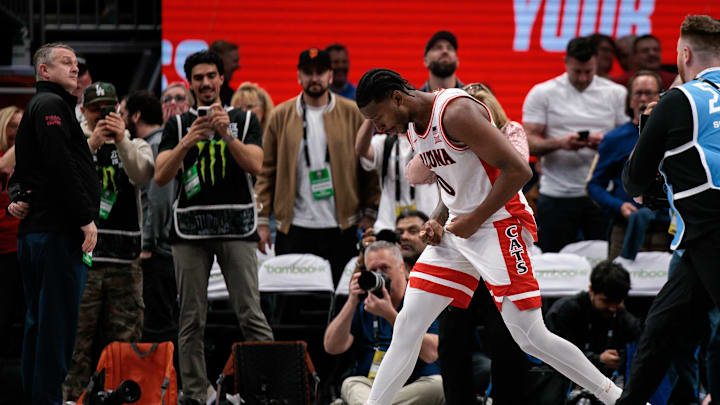 Mar 13, 2026; Kansas City, MO, USA; Arizona Wildcats guard Jaden Bradley (0) reacts at the end of the game against the Iowa State Cyclones at T-Mobile Center. Mandatory Credit: William Purnell-Imagn Images