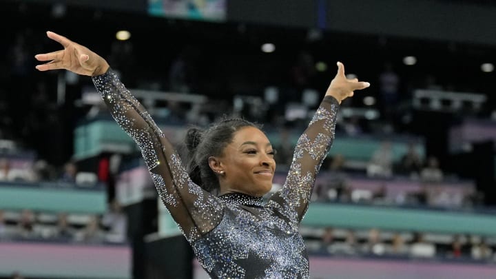 Jul 28, 2024; Paris, France; Simone Biles of the United States performs on the vault in womenís qualification during the Paris 2024 Olympic Summer Games at Bercy Arena. Mandatory Credit: Kyle Terada-USA TODAY Sports