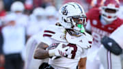Mississippi State Bulldogs wide receiver Anthony Evans III (3) runs after a catch during the third quarter against the Arkansas Razorbacks at Donald W. Reynolds Razorback Stadium. Bulldogs won 38-35.