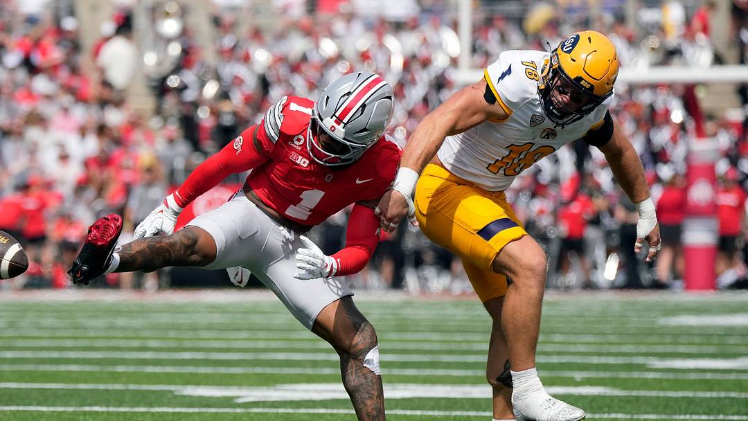 Ohio State Buckeyes safety Earl Little Jr. (1) knocks the ball away from Kent State Golden Flashes tight end Hunter Hopperton (18) in the second quarter of the NCAA football game at Ohio Stadium on Sept. 19, 2026.