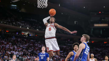 Feb 25, 2024; New York, New York, USA;  St. John's Red Storm guard Daniss Jenkins (5) goes up for a