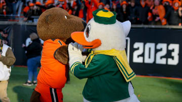 The Oregon Duck and Benny the Beaver have a pillowfight on the turf as the No. 9 Oregon Ducks take on the No. 21 Oregon State Beavers at Reser Stadium in Corvallis, Ore. Saturday, Nov. 26, 2022.

Ncaa Football Uo Vs Osu Rivalry Game University Of Oregon At Oregon State