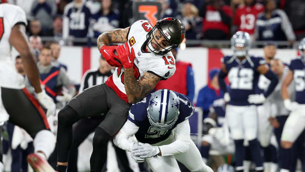  Tampa Bay Buccaneers wide receiver Mike Evans (13) makes a catch against Dallas Cowboys cornerback Trevon Diggs