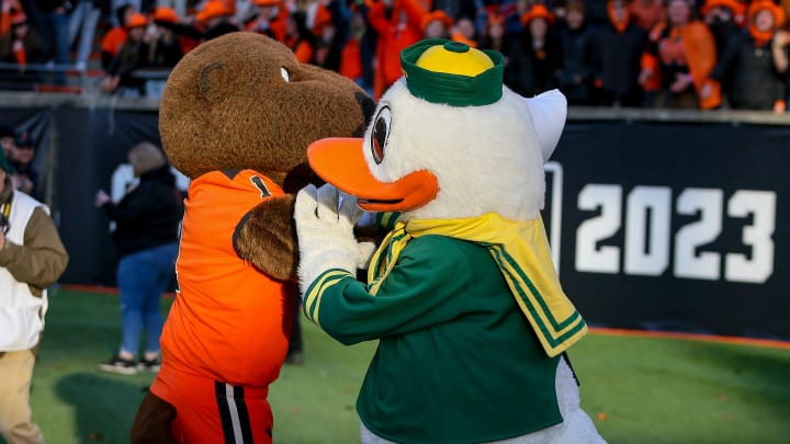 The Oregon Duck and Benny the Beaver have a pillowfight on the turf as the No. 9 Oregon Ducks take on the No. 21 Oregon State Beavers at Reser Stadium in Corvallis, Ore. Saturday, Nov. 26, 2022.

Ncaa Football Uo Vs Osu Rivalry Game University Of Oregon At Oregon State