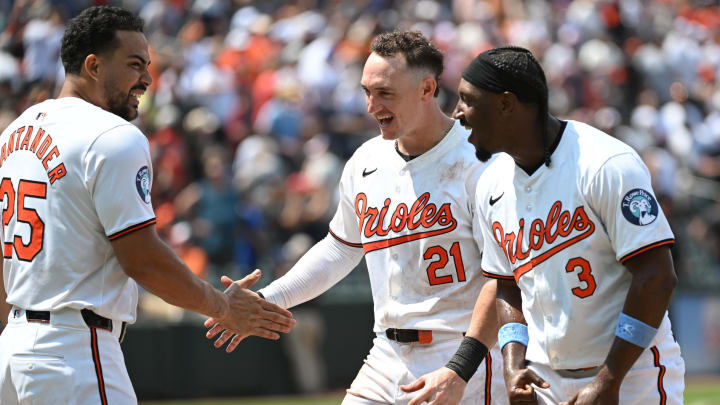 Jul 14, 2024; Baltimore, Maryland, USA;  Baltimore Orioles outfielder Anthony Santander (25), Austin Hays (21) and Jorge Mateo (3) celebrate a win.