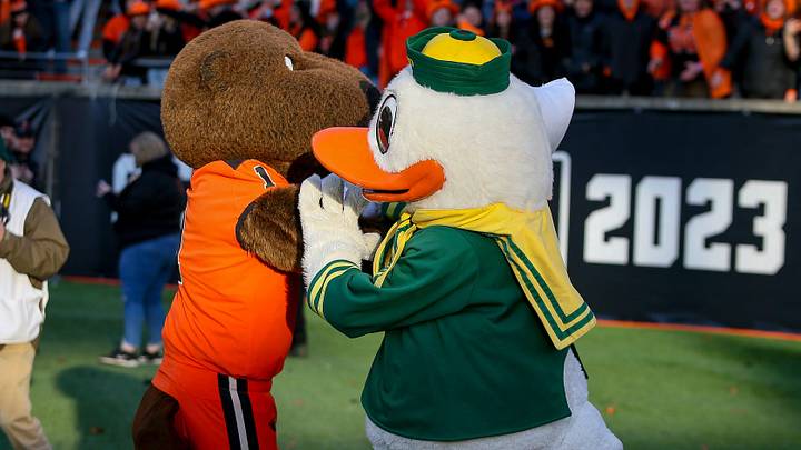 The Oregon Duck and Benny the Beaver have a pillowfight on the turf as the No. 9 Oregon Ducks take on the No. 21 Oregon State Beavers at Reser Stadium in Corvallis, Ore. Saturday, Nov. 26, 2022.

Ncaa Football Uo Vs Osu Rivalry Game University Of Oregon At Oregon State