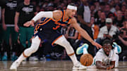 May 12, 2025; New York, New York, USA; Boston Celtics guard Jrue Holiday (4) reaches for the ball against New York Knicks guard Josh Hart (3) in the first half during game four of the second round for the 2025 NBA Playoffs at Madison Square Garden. Mandatory Credit: Vincent Carchietta-Imagn Images