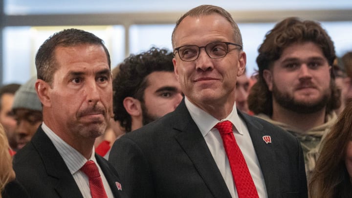 Wisconsin's new head football coach Luke Fickell, left is shown with athletic director Chris McIntosh at a welcome event November 28, 2022 at Camp Randall Stadium in Madison. He was previously head coach for six seasons at Cincinnati.