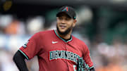 Sep 10, 2025; San Francisco, California, USA; Arizona Diamondbacks pitcher starting Eduardo Rodriguez (57) waits while manager Torey Lovullo comes to remove him for a reliever during the seventh inning against the San Francisco Giants at Oracle Park. Mandatory Credit: D. Ross Cameron-Imagn Images