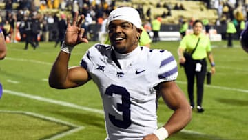Oct 12, 2024; Boulder, Colorado, USA; Kansas State Wildcats running back Dylan Edwards (3) celebrates as he leaves the field after a win against the Colorado Buffaloes at Folsom Field. Mandatory Credit: Christopher Hanewinckel-Imagn Images