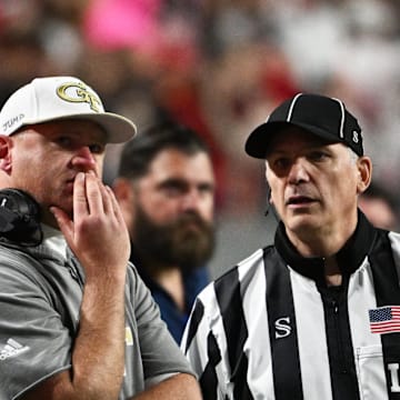 Nov 1, 2025; Raleigh, North Carolina, USA;  Georgia Tech Yellow Jackets head coach Brent key during the first quarter at Carter-Finley Stadium. Mandatory Credit: Zachary Taft-Imagn Images