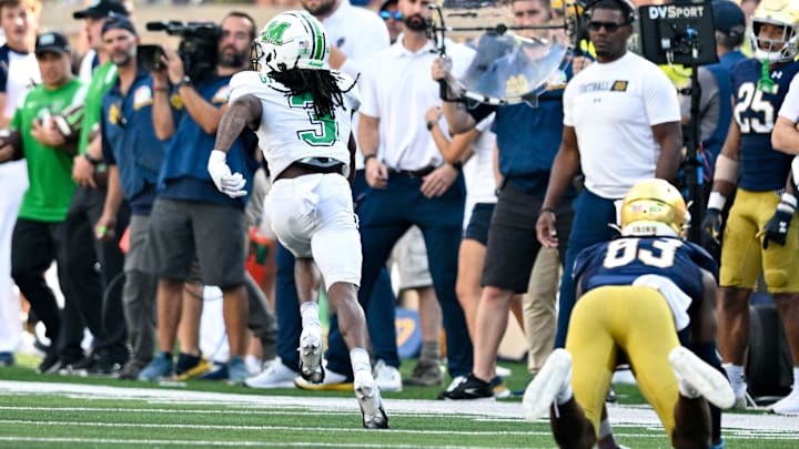 Sep 10, 2022; South Bend, Indiana, USA; Marshall Thundering Herd defensive back Steven Gilmore (3) runs an interception back for a touchdown in the fourth quarter against the Notre Dame Fighting Irish at Notre Dame Stadium. Mandatory Credit: Matt Cashore-Imagn Images