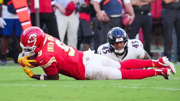 Kansas City Chiefs wide receiver JuJu Smith-Schuster (9) is tackled by Baltimore Ravens linebacker Mike Green in Week 4.