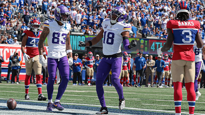 Sep 8, 2024; East Rutherford, New Jersey, USA; Minnesota Vikings wide receiver Justin Jefferson (18) celebrates his touchdown reception during the first half against the New York Giants at MetLife Stadium.