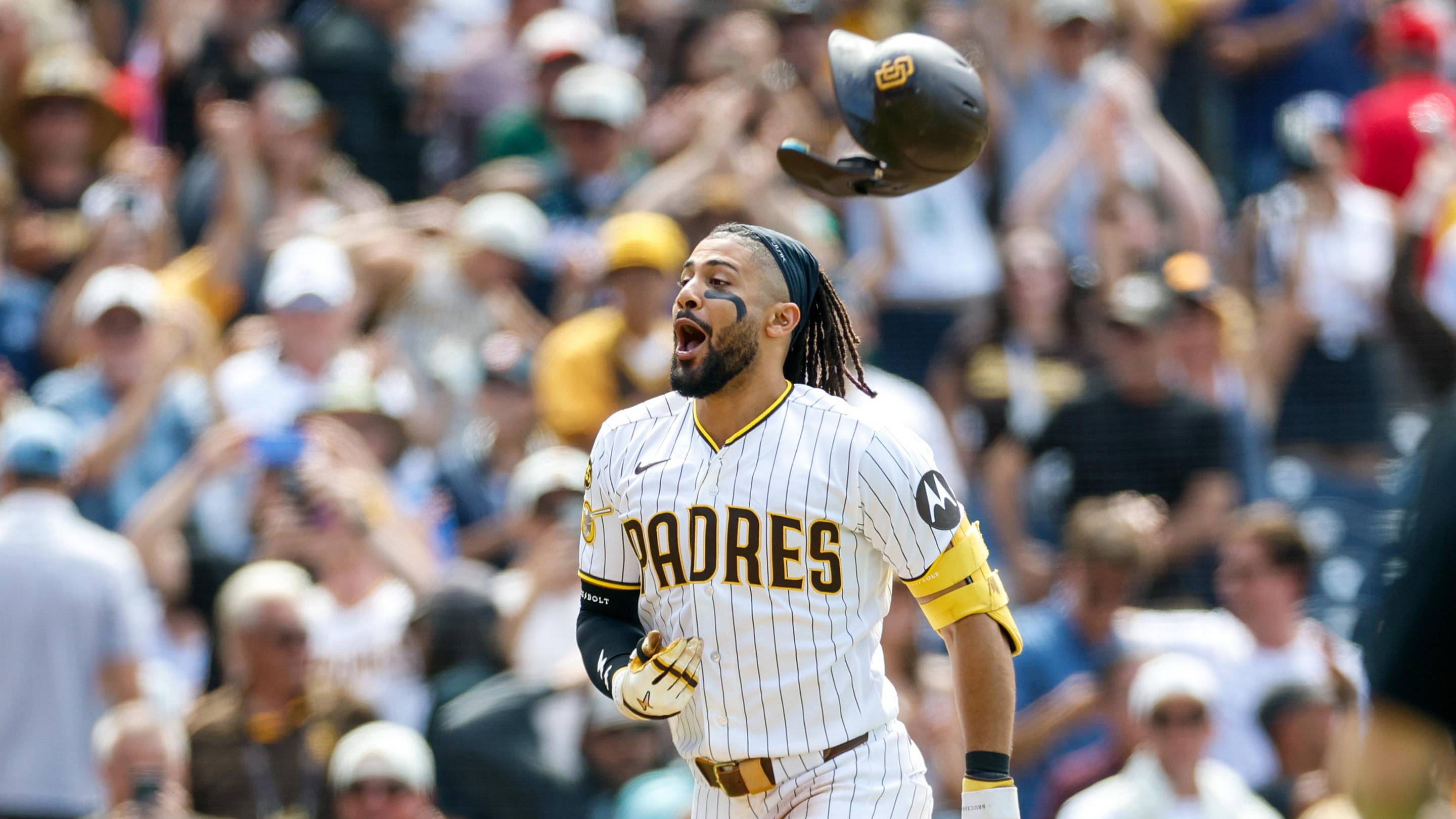 Jun 10, 2026; San Diego, California, USA; San Diego Padres second baseman Fernando Tatis Jr. (23) celebrates after hitting a one run home run during the ninth inning against the Cincinnati Reds at Petco Park. Mandatory Credit: David Frerker-Imagn Images