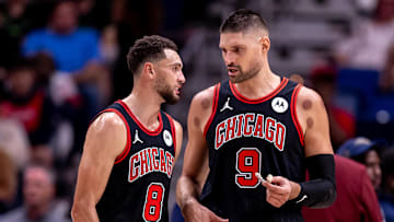 Oct 23, 2024; New Orleans, Louisiana, USA;  Chicago Bulls guard Zach LaVine (8) and center Nikola Vucevic (9) talk on a time out against the New Orleans Pelicans during the first half at Smoothie King Center. Mandatory Credit: Stephen Lew-Imagn Images