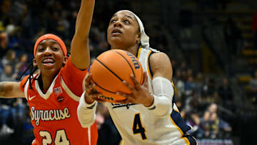 Kayla Williams drives to the hoop against Syracuse