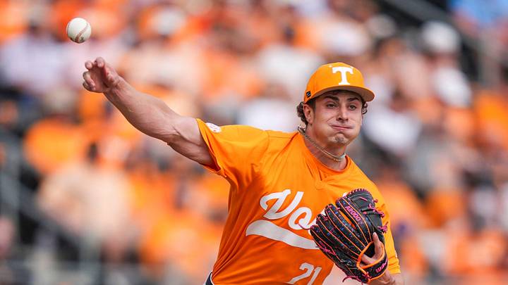 Tennessee pitcher Tegan Kuhns (21) throws the ball to first base during a NCAA baseball game between Tennessee and Ole Miss at Lindsey Nelson Stadium on April 18, 2026.
