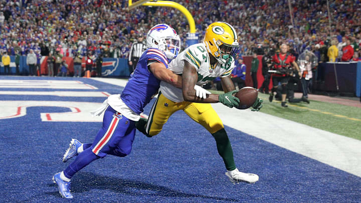 Packers receiver Romeo Doubs  catches a 19 yards touchdown pass as he beats the tight coverage by Bills safety Damar Hamlin.

Ag3i6467