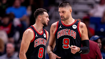 Oct 23, 2024; New Orleans, Louisiana, USA;  Chicago Bulls guard Zach LaVine (8) and center Nikola Vucevic (9) talk on a time out against the New Orleans Pelicans during the first half at Smoothie King Center. Mandatory Credit: Stephen Lew-Imagn Images