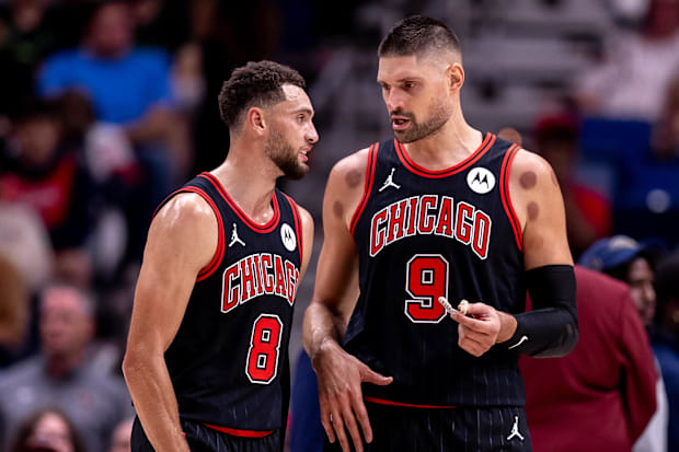 Chicago Bulls guard Zach LaVine (8) and center Nikola Vucevic (9) Chicago Bulls guard Zach LaVine (8) and center Nikola Vucevic (9)