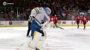 Jordan Binnington tried to swipe the puck from Alex Ovechkin’s 900th goal