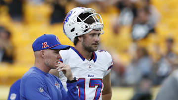 Aug 17, 2024; Pittsburgh, Pennsylvania, USA;  Buffalo Bills head coach Sean McDermott (left) and quarterback Josh Allen (17) talk on the field before the game against the Pittsburgh Steelers at Acrisure Stadium. Mandatory Credit: Charles LeClaire-Imagn Images