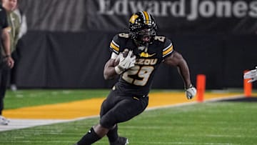 Nov 15, 2025; Columbia, Missouri, USA; Missouri Tigers running back Ahmad Hardy (29) runs the ball against the Mississippi State Bulldogs during the second half of the game at Faurot Field at Memorial Stadium. Mandatory Credit: Denny Medley-Imagn Images