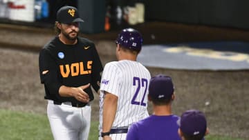 Tennessee head coach Tony Vitello shakes hands with Evansville head coach Wes Carroll after Tennessee's win in the Knoxville Super Regional of the NCAA baseball tournament on Sunday, June 9, 2024 in Knoxville, Tenn.