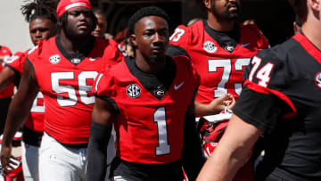 Georgia running back Trevor Etienne (1) arrives with the team before the start of the G-Day spring football game in Athens, Ga., on Saturday, April 13, 2024.