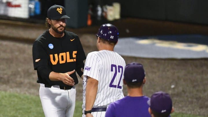 Tennessee head coach Tony Vitello shakes hands with Evansville head coach Wes Carroll after Tennessee's win in the Knoxville Super Regional of the NCAA baseball tournament on Sunday, June 9, 2024 in Knoxville, Tenn.